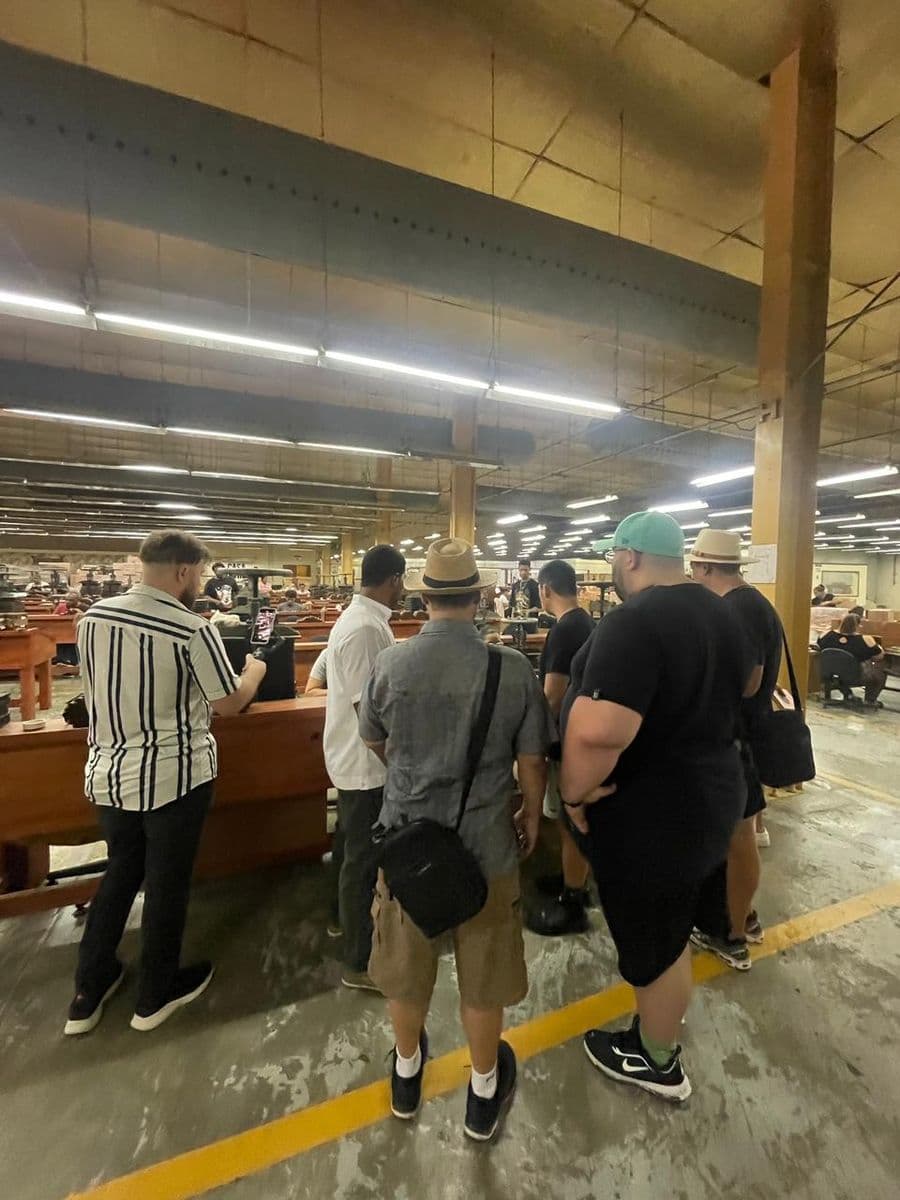 Guided tour of the E.P. Carrillo warehouse showcasing premium Dominican tobacco leaves.