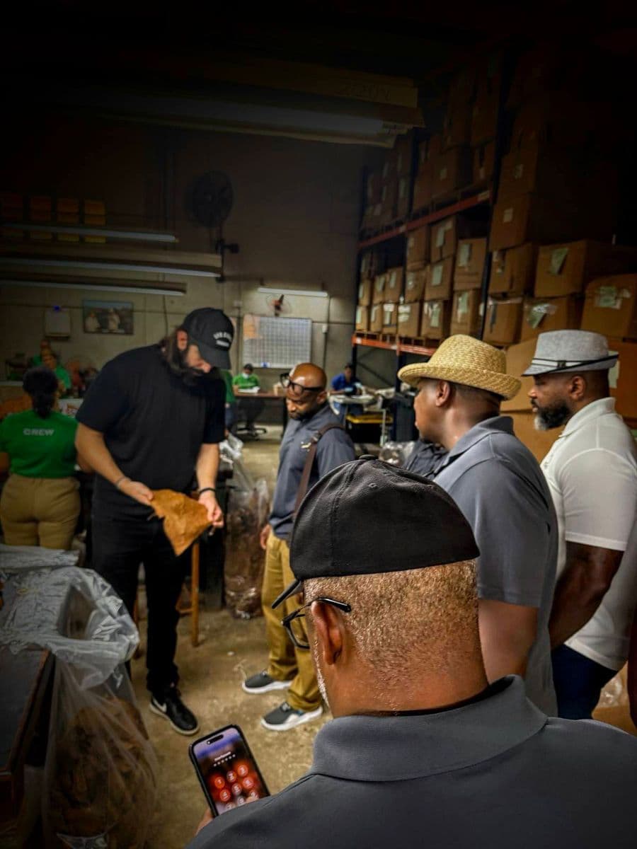 Inside the La Flor Dominicana warehouse with Tony Gomez explaining the cigar-making process.