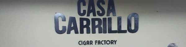 Workers sorting premium tobacco leaves at Casa Carrillo Cigar Factory in Santiago, Dominican Republic.