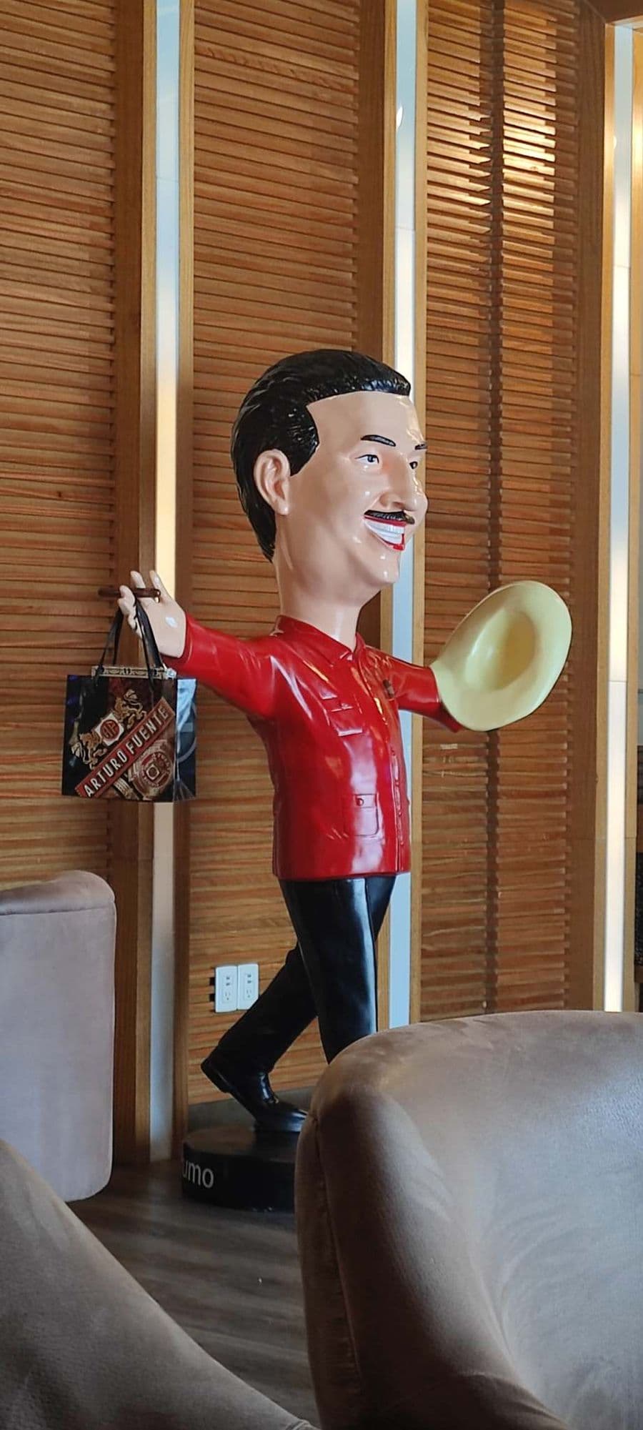 Visitors arriving at the iconic Arturo Fuente cigar factory in Santiago, Dominican Republic.